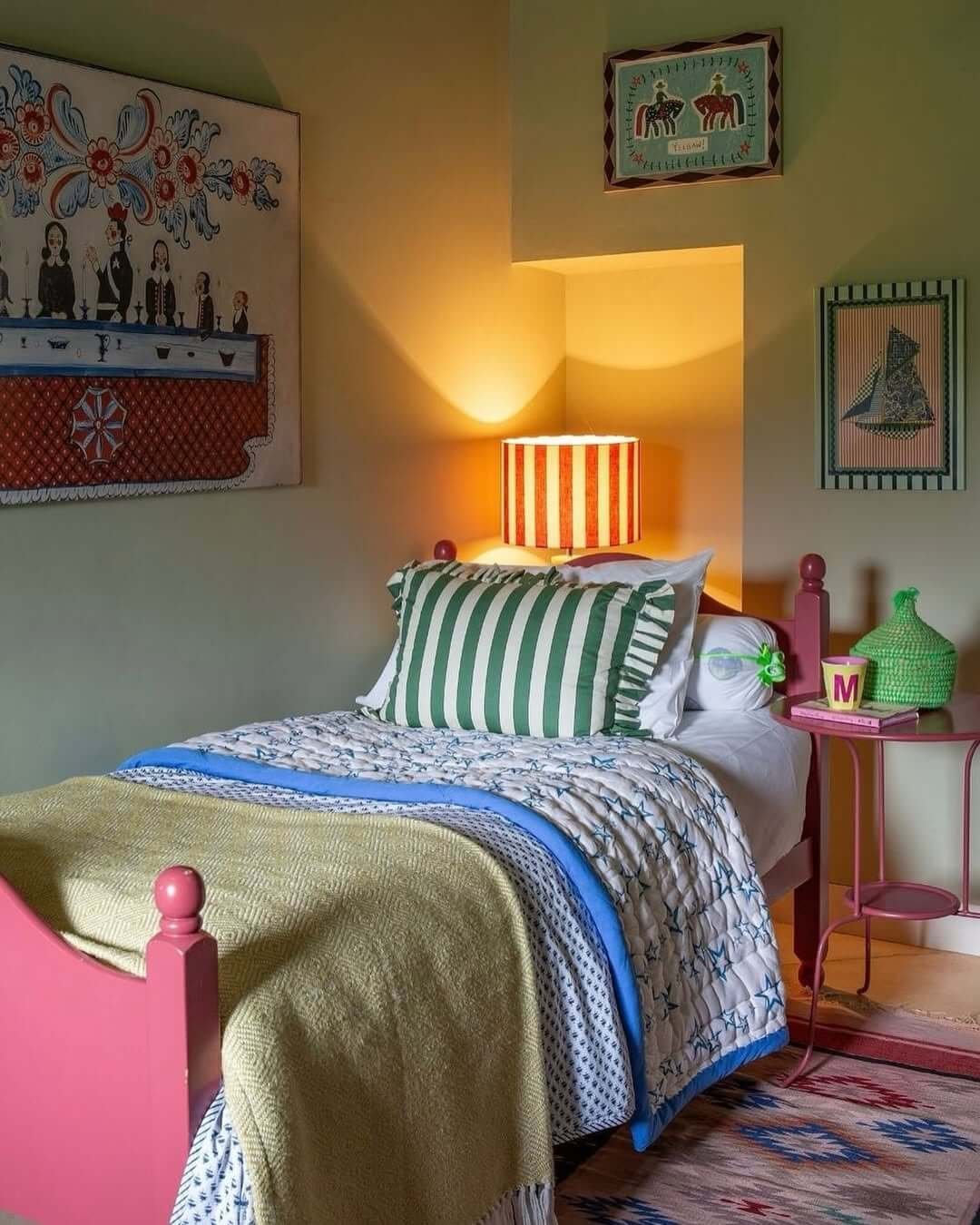 Charming pink bed and playful decor inspire creativity
