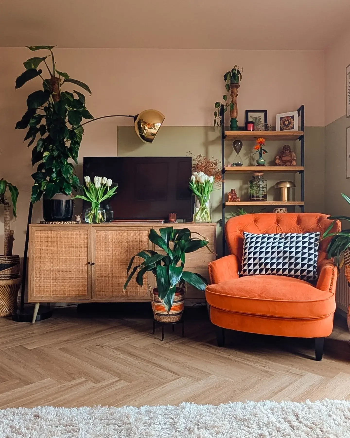 Serene blush and earthy green colors create a calming space