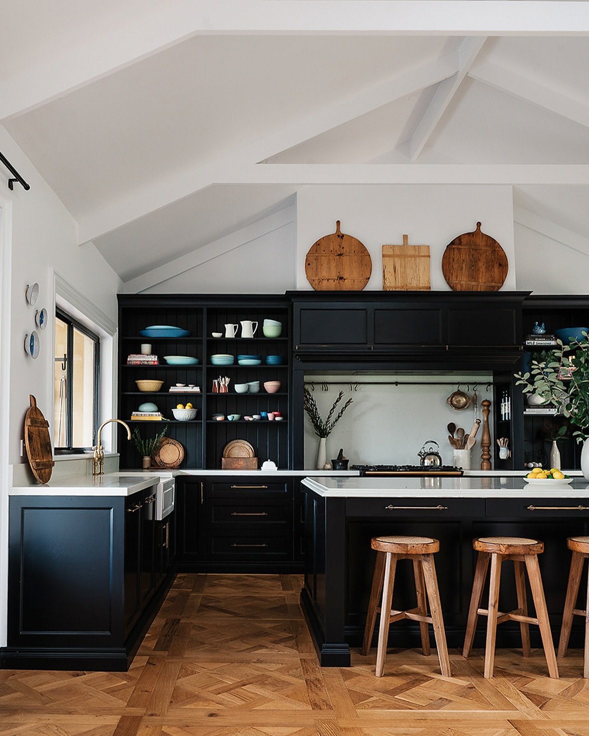 Bold Black Cabinets Showcase Colorful Dishware